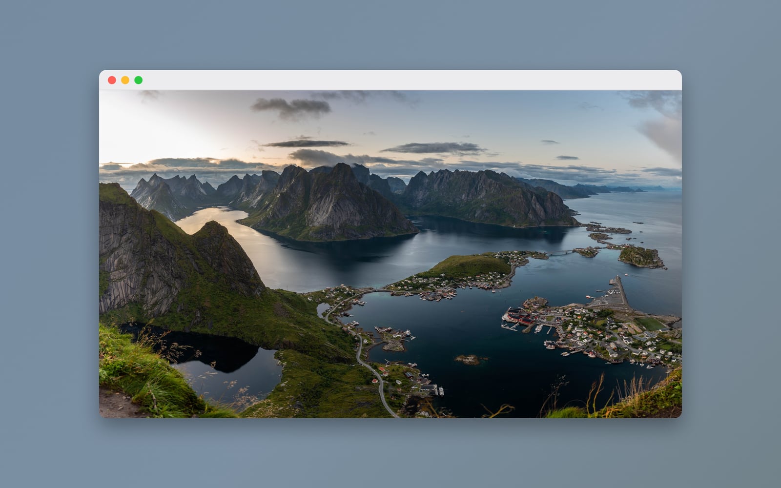 A photo of the fjords of Lofoten in a generic Mac window frame, on an Auto-match background.